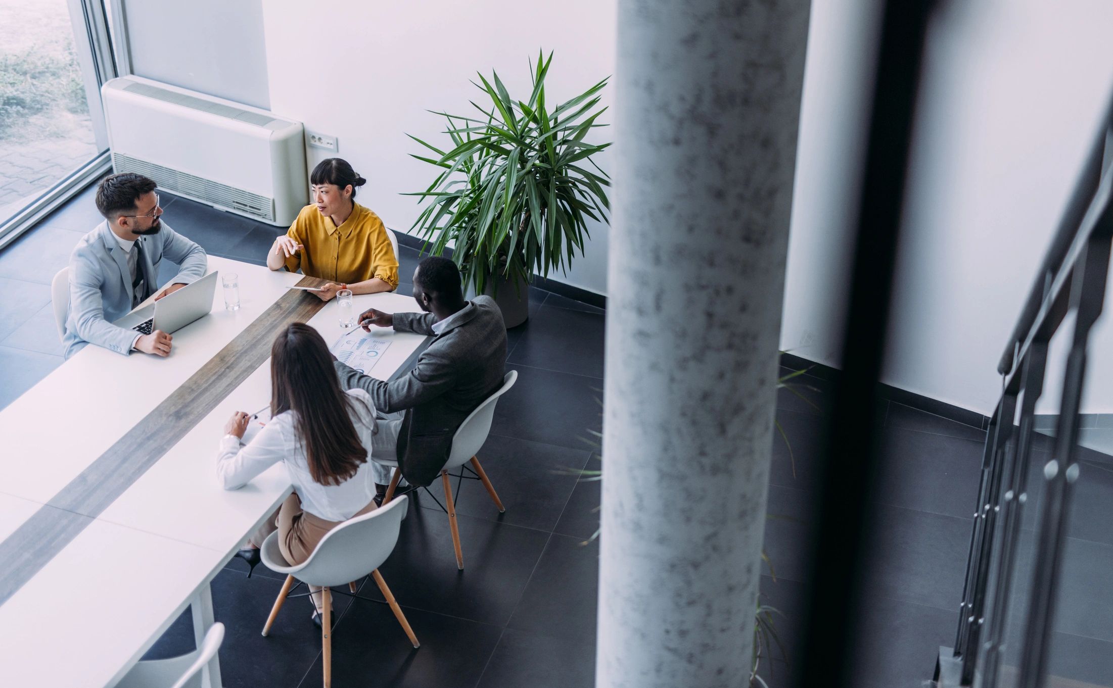 Business team collaborating around a conference table