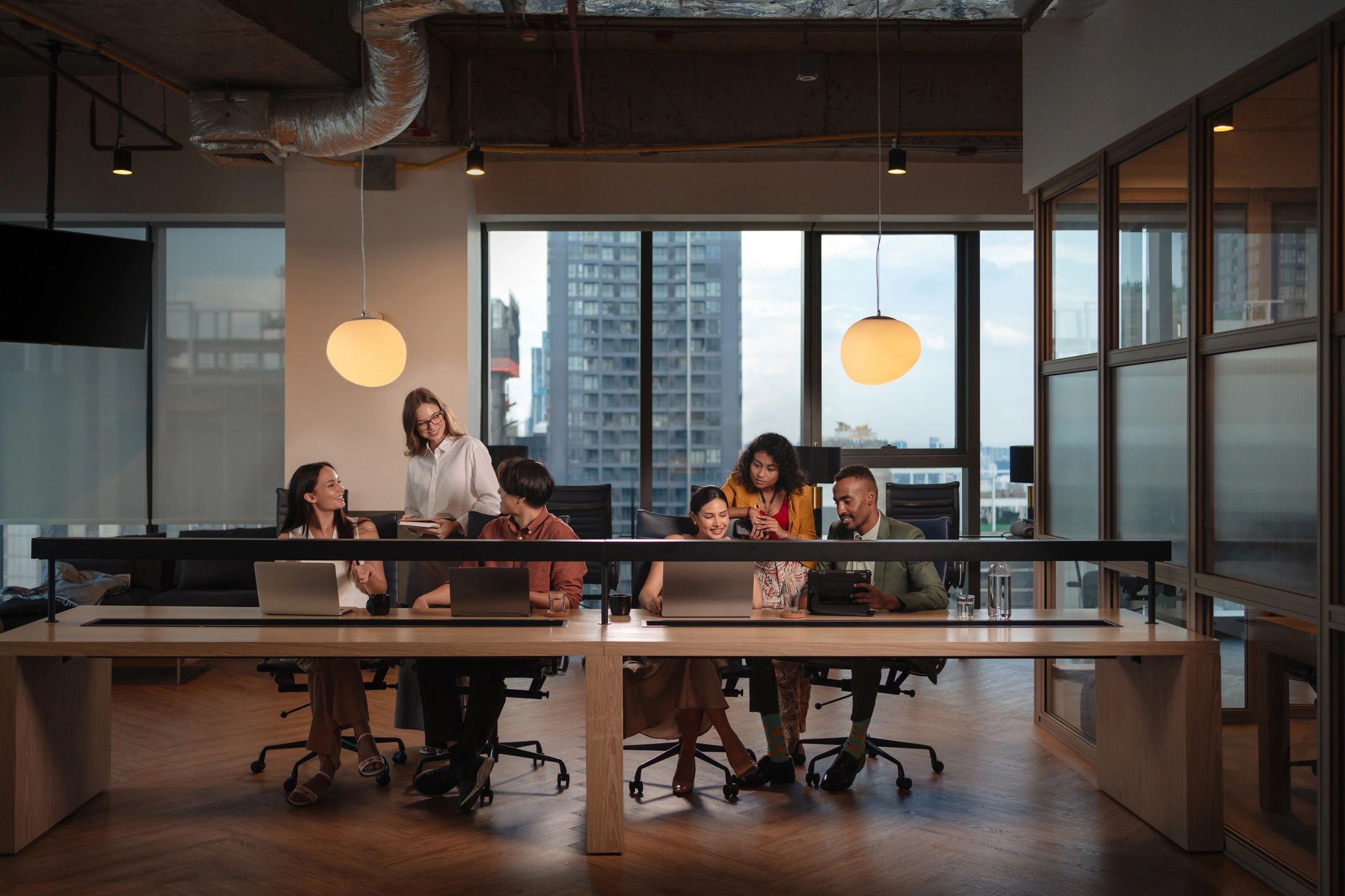 Technology consultants working together in a modern office